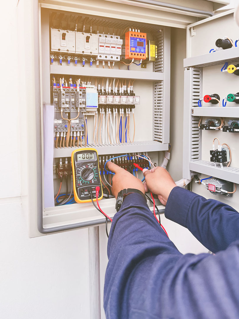 Electrician maintenance on electric power control multimeter